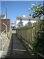 Footpath north from Willow Street past a clothes-drying area