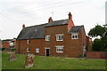 Harpole High Street from the churchyard