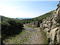 J2217 : View south from the gate at the top of Kilfeaghan Road by Eric Jones