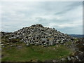 NZ0298 : Simonside Summit Cairn by Anthony Foster