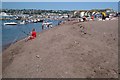 SX9372 : Fishing and relaxing, back beach, Teignmouth by Robin Stott