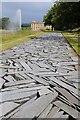 SK2669 : Pavement at Chatsworth by Philip Halling