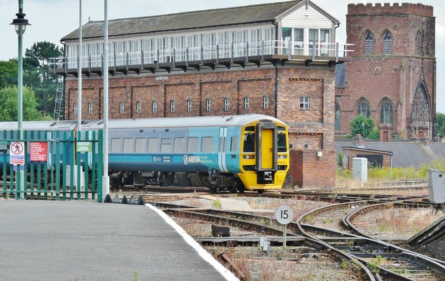 Shrewsbury: signalbox, train and Abbey