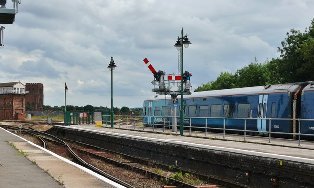 Shrewsbury: semaphore signal with train