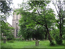 TQ3987 : The Church of St. John The Baptist, High Road Leytonstone / Church Lane, E11 - tower and churchyard by Mike Quinn