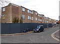 Boarded-up  fenced-off housing in Oxford