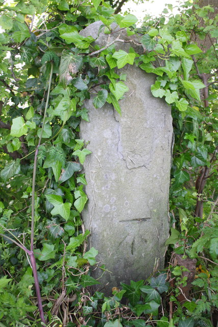 Benchmark on stone post beside Sir John's Lane