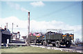 Army vehicles taking refuse into the incinerator that used to be beside Dawsholm Park