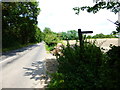 Looking eastwards on Pirbright Road from footpath junction