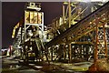 Night view of aggregate conveyors at Angerstein