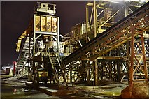 TQ4079 : Night view of aggregate conveyors at Angerstein's Wharf by David Martin