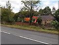 Earth moving machine alongside the remains of Panteg and Griffithstown railway station