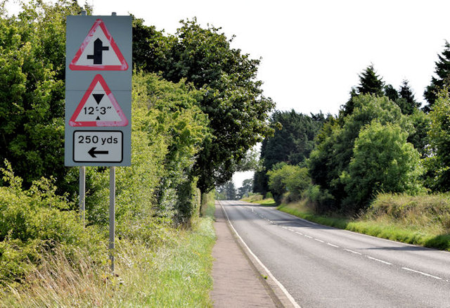 Staggered crossroads and height restriction signs, Templepatrick (August 2014)