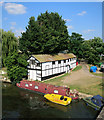 Old boat house by the bridge