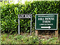 TM3193 : Low Road & Hill House Farm signs by Geographer