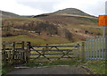 Wooden gate to a public footpath in Cwmparc