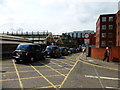 Taxis queueing in Orinoco Lane for Wimbledon Station