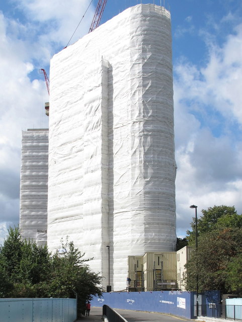 Scaffolding shrink-wrapped during high-rise construction