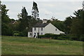 View of a detached house in Matching Green from the green