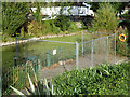 Fenced off area by pond, Feltham Park