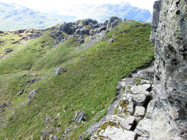 Don’t look down – the narrow ledge on the highest point of “The Cobbler”