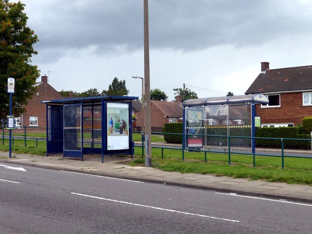 Back-to-back bus shelters