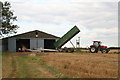 TF3865 : Stocking up the grain store on Brickyard Lane by Chris