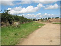 Triangulation pillar beside a farm track