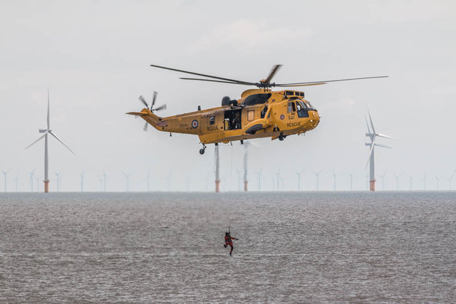 RNLI Volunteer leaving Sea King Helicopter, Clacton, Essex