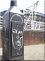 A face on a lamppost