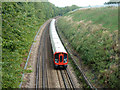 Metropolitan Line train approaching bridge MR103