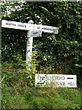 TL9933 : Roadsign on Church Road by Geographer