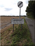 TM0333 : Langham Village Name sign by Geographer
