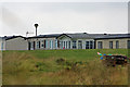 TA0983 : Holiday homes on Gristhorpe Cliff by Pauline E