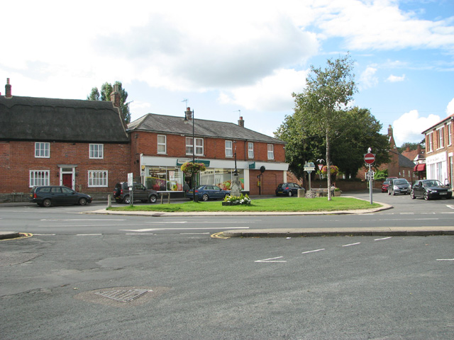 View across the junction of The Street, Mill Lane, Old Road and New Road