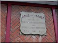 Plaque on Peasenhall Almshouses