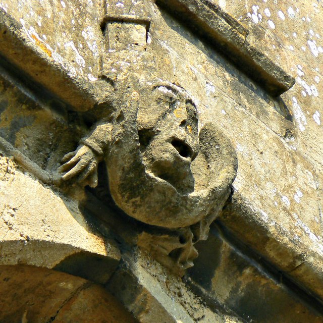 Cheeky grotesque, Church of St Cyriac, Lacock, Wiltshire
