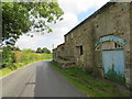 Road and Disused Dairy Building near Coverham