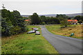 Cars parking just outside the restricted zone in Goathland