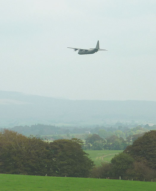Military transport plane flying up the Lune Valley