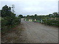 Gated farm track off Kirton Road