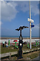 SH9478 : National Cycle Marker Post at Pensarn by Ian S