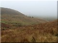 Misty moorland valley