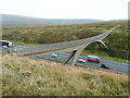 SD9814 : The Pennine Way footbridge over the M62 by Humphrey Bolton