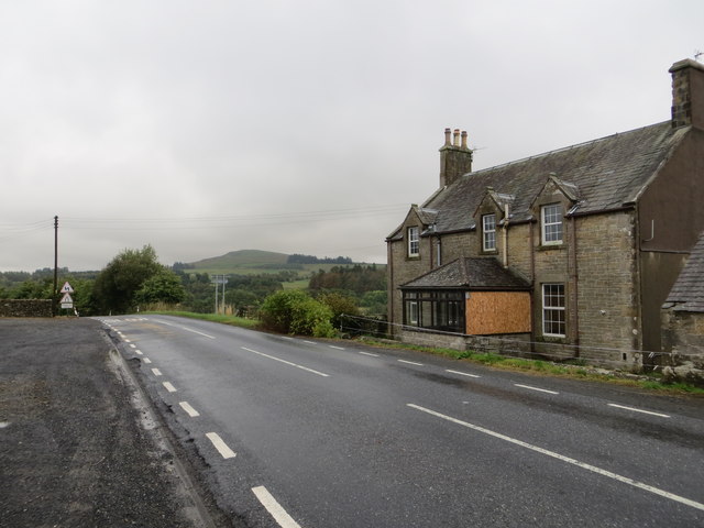 Road (B6357) and Empty House at Under Burnmouth