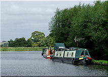 SJ9822 : Moored narrowboats on Tixall Wide, Staffordshire by Roger  D Kidd