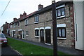 Terrace of stone houses in North Street, Winterton