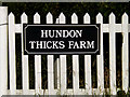 TL7448 : Hundon Thicks Farm sign by Geographer