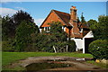 TQ0045 : Cottage Near Bramley, Surrey by Peter Trimming