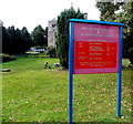 Pink red and blue church nameboard, Gobowen